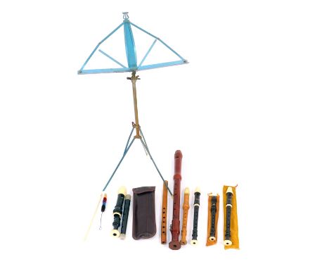 A group of recorders and treble recorders, to include a Schott recorder, together with music stand. 