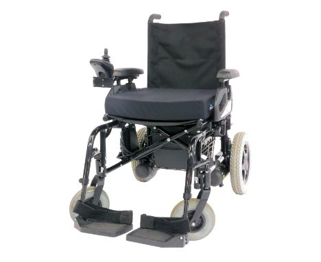 A Sunrise Medical Powertec F40 mobility chair, model number F40VR, with instruction manual and charging cable. 