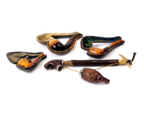 A group of pipes and pipe parts, comprising a Louvenir wooden pipe, in fitted case with amber mouthpiece, a silver collared W