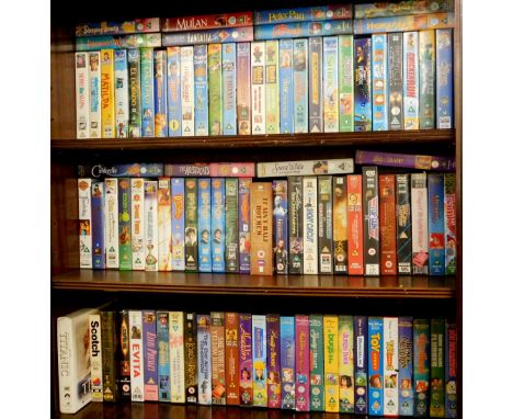 Various Disney and other VHS tapes, to include Lady and the Tramp, The Aristocats, Snow White and the Seven Dwarfs, Mulan, Pe