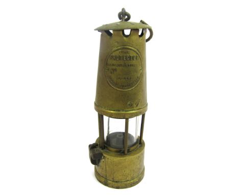A Protector Lamp and Lighting Company Eccles brass miner's lamp, with swing handle, 26cm high. 