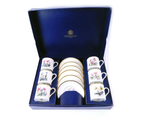 A Royal Worcester porcelain Botanical cased coffee can set, comprising six coffee cans and saucers, each decorated with flowe