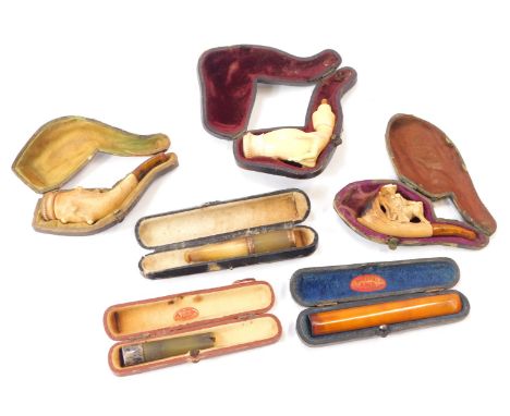 Six pipes, comprising an amber cheroot holder, meerschaum and amber pipe, meerschaum handled partial pipe, etc. (6, AF) 
