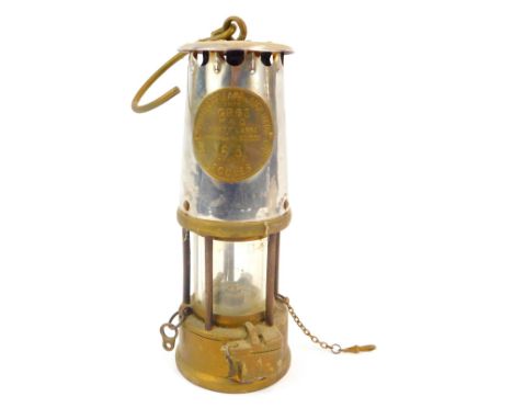A Protector Lamp and Lighting Company Eccles miner's lamp, type GR6S, with swing handle, 25cm high. 