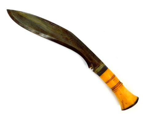 An Indian Kukri, with bone handle and curved steel blade, in black leather scabbard, length of blade 32.5cm. 