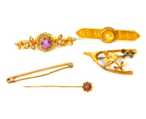 A group of Victorian and later bar brooches, comprising an amethyst and seed pearl floral brooch, yellow metal unmarked, 4cm 