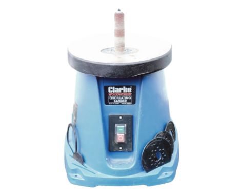 A Clarke Woodworker electric oscillating sander, model number CO851. 