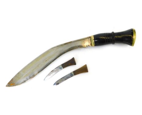 A Nepalese or Indian Kukri, with painted wooden handle, curved steel blade, together with the two Karda and Chakmak knives, i