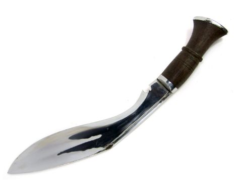 An Indian Kukri, with wooden handle, on curved steel blade, in leather scabbard (AF), length of blade 28cm.