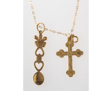 A Welsh 'love' spoon pendant with chain and a cross pendant, an openwork Welsh 'love' spoon pendant, UK import mark for 375 t