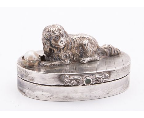 A 20th century silver snuff box with Russian marks for Moscow unknown maker, of oval form with a spaniel lying in front of a 