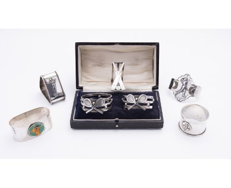 A mixed group of silver ball sports napkin rings including; a cased pair of cast tennis rings by William Hutton & Sons Ltd, S