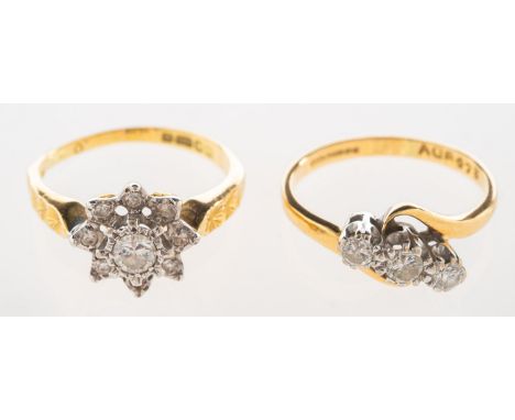 Two 18ct gold diamond rings, including a three stone twist ring set with three brilliant-cut diamonds, diamonds approx. 0.16 
