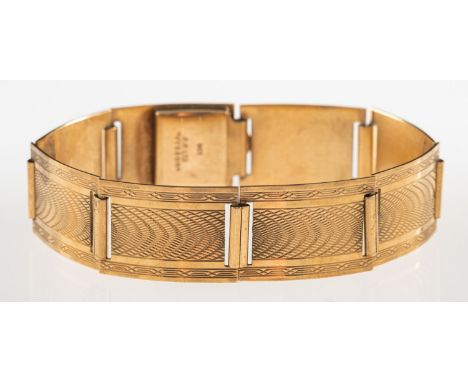 An Art Deco bracelet, made up of articulated rectangular links with engine turned engraving, push-in clasp, marked 9ct, P.P L