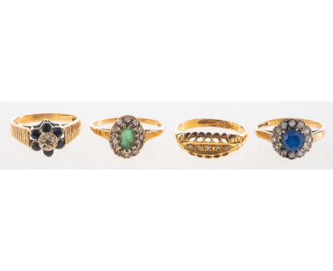 A group of four rings, including an 18ct gold five stone ring set with graduated old-cut diamonds, UK hallmark, size O1/2 to 