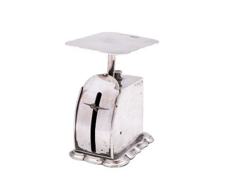 A set of Edward VII silver postal scales by Goldsmiths & Silversmiths Co Ltd, London 1903, Rd. 308820, marks rubbed, 7cm high