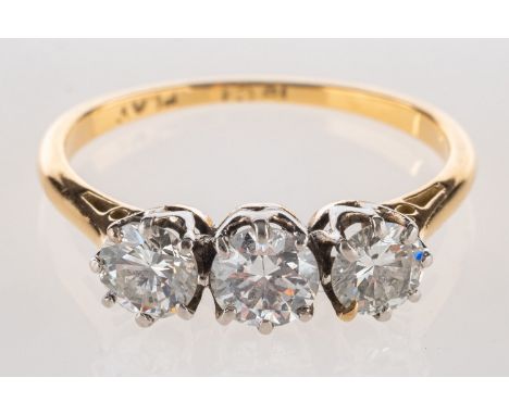A diamond trilogy ring, claw set with three brilliant-cut diamonds, diamonds approx. 0.90 carat total, marked 18ct & Plat, si