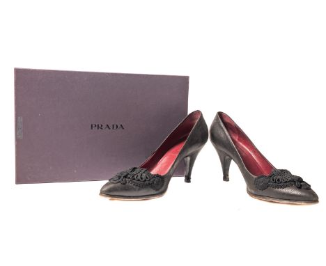 Prada. A pair of Antic Alamari pumps, in the colour Nero (black), toe embellished with black embroidery, size 37, heel height