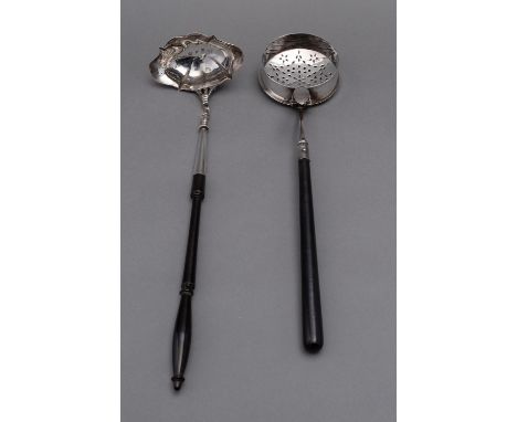 A George II silver double spout punch ladle by David Hennell I, London 1750, cast C scroll stem and turned wooden handle, 33c