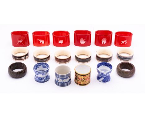 A set of six 20th century Orrefors cased red glass napkin rings etched with animals, engraved script Orrefors to the edge, of