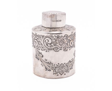 A Victorian silver tea caddy by Atkin Brothers, Sheffield 1893, of circular form, with pull off lid, decorated with embossed 