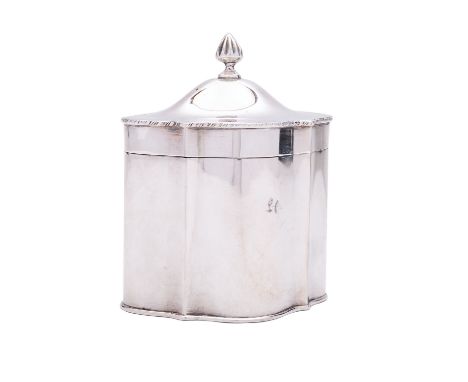 An early 19th century Sheffield Plate tea caddy, not marked, of serpentine form, the domed hinged lid with fluted finial, 10.