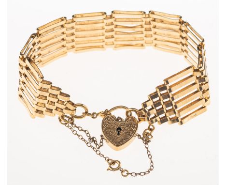 A gate bracelet with heart padlock, the heart padlock with foliate engraving to front, safety chain, heart padlock UK hallmar