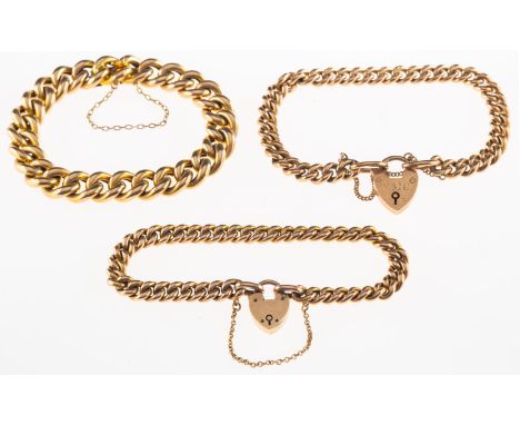 A group of three antique bracelets, including a curb link bracelet with push-in clasp and safety chain, clasp marked 15, leng