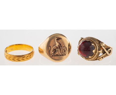 A group of three rings, including a 9ct gold signet ring with engraved crest, UK hallmark, size approx. G1/2 (oval), 8.1grams