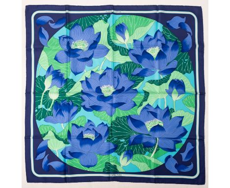 Hermes.  A silk Hermes scarf, Fleures de Lotus by Christene Vauzelles 1961, blue and green, approx. 88cm x 88cm. 