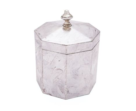 A George V silver tea caddy by Pairpoint Brothers, London 1915, of octagonal form, the domed hinged lid with case vase shaped