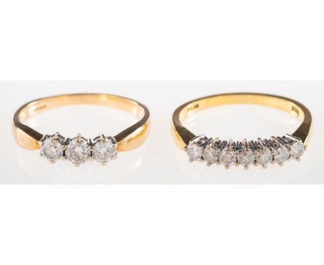 A group of two diamond rings, including an 18ct gold seven stone diamond ring, diamonds approx. 0.42 carat total, UK hallmark