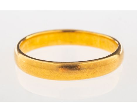 A 22ct gold wedding band, UK hallmarks, size K, 2.8grams.