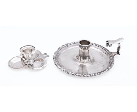 A George III silver chamber stick by William Stroud, London 1820, of circular form, gadrooned rim, engraved thumb piece with 