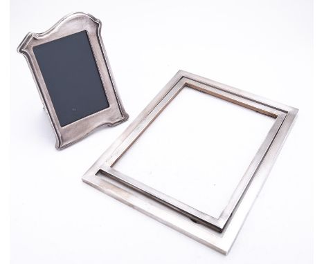 A large George V silver photograph frame by Mappin & Webb, Birmingham 1914, with engine turned decoration 28x21.5cms internal