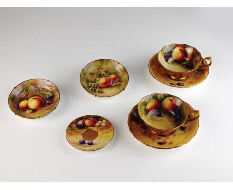 Royal Worcester fruit-painted wares to include, a teacup by R Austin, a teacup by W.H Austin, a saucer by H. Ayrton, a saucer