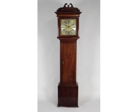 A George III eight day longcase clock, the 12 inch square brass dial signed 'Edward Upjohn' to the silvered chapter ring, wit