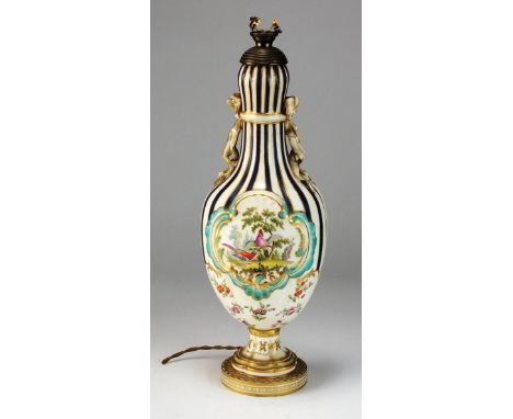 A 19th century English porcelain vase, probably Minton, the lobed blue striped body with moulded ribbon handles, and a painte