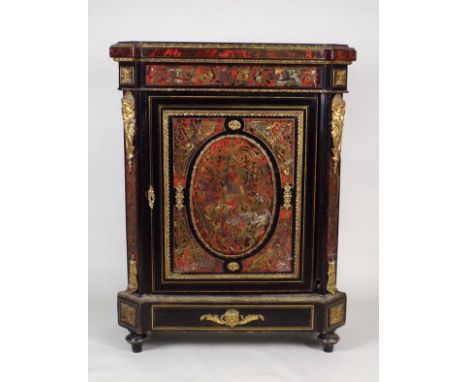 A 19th century ebonised and Boulle style pier cabinet with gilt metal mounts, the single door with oval central panel opening