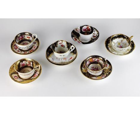 English florally painted teacups and saucers, early 19th century, comprising a Coalport Empire-shape cup and saucer, unmarked