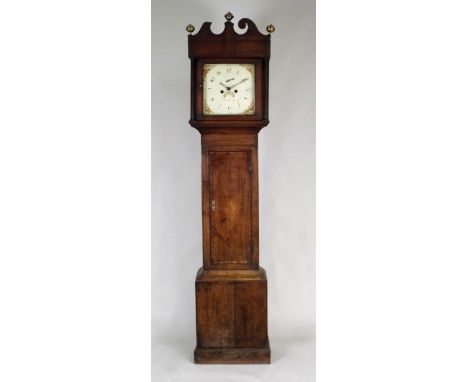 A late George III oak crossbanded eight day longcase clock, the 12 inch square painted dial signed 'J Davies, Leominster' (in