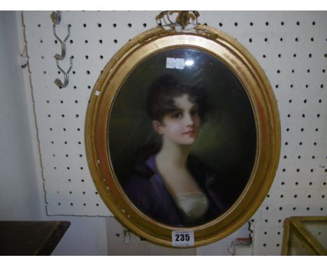 A 19TH CENTURY PASTEL PORTRAIT OF A YOUNG LADY IN AN OVAL GILT FRAME (SOME DAMAGE TO THE FRAME) 