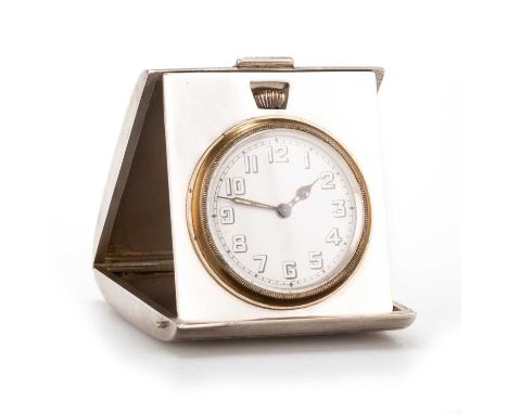 AN ART DECO SILVER TRAVELLING CLOCK by Adie Brothers Ltd, Birmingham 1925, of oval-section, the case with engine-turned decor