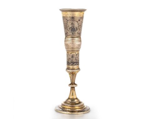 A RUSSIAN SILVER-GILT AND NIELLO FLUTE 1834, the slender bowl decorated with two portrait reserves and scrolling foliage, the