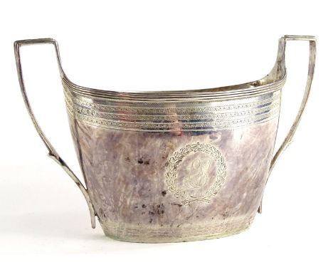 A George IV silver two handled sugar bowl, with engine turned bands, a central leaf cartouche bearing initials ES to one side