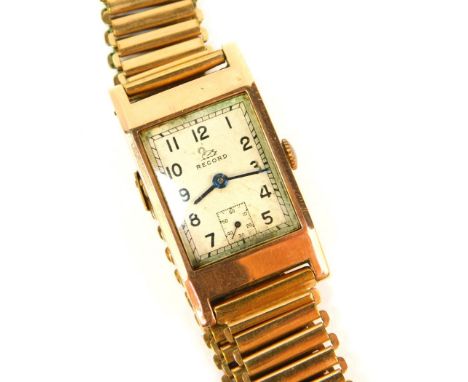 A 9ct rose gold Record Art Deco tank design gentleman's wristwatch with Swiss 15 jewel movement, London 1946, on a rolled gol