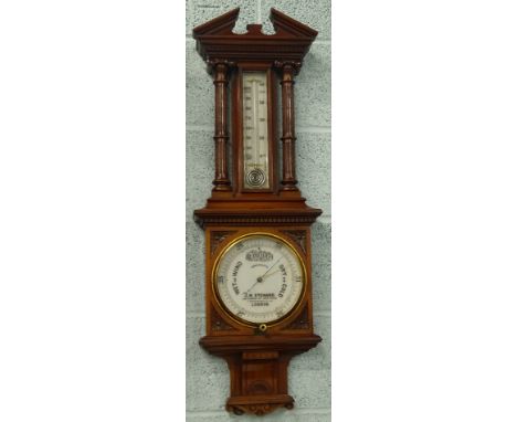 A late 19thC walnut aneroid barometer, the dial stamped J H Steward, 406 Strand, 457 West Strand, 7 Grace Church Street E.C L