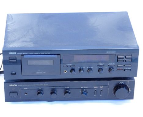 A Yamaha natural sound stereo cassette deck, model KX-383 and a Denon model PAM-250 II amplifier (2).