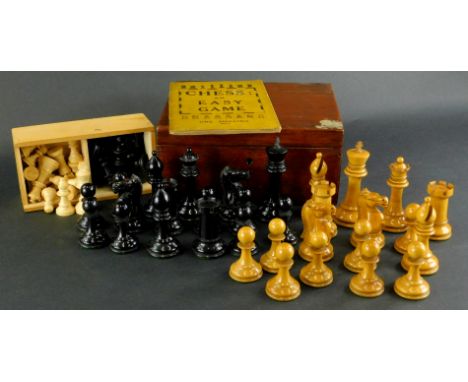 A Staunton turned and carved box wood and part ebonised chess set, each piece stamped with a crown with a mahogany box, 10cm 