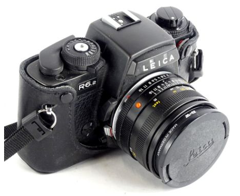 A Leica R6.2 camera, with Leica summicron-a1:24/50 lens.